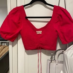 Urban outfitters red cropped top.